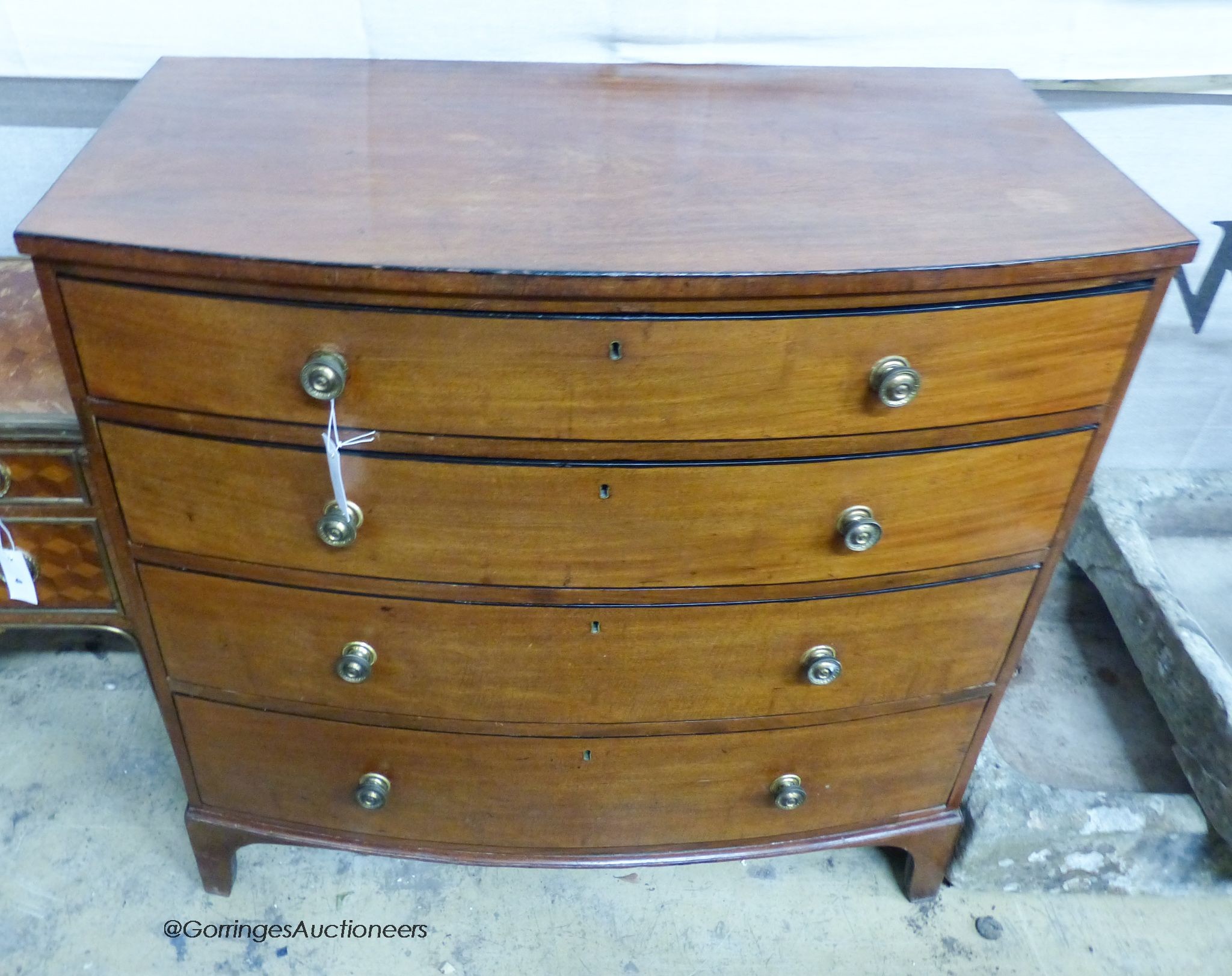 A Regency mahogany bow front chest of drawers, width 93cm, depth 49cm, height 91cm